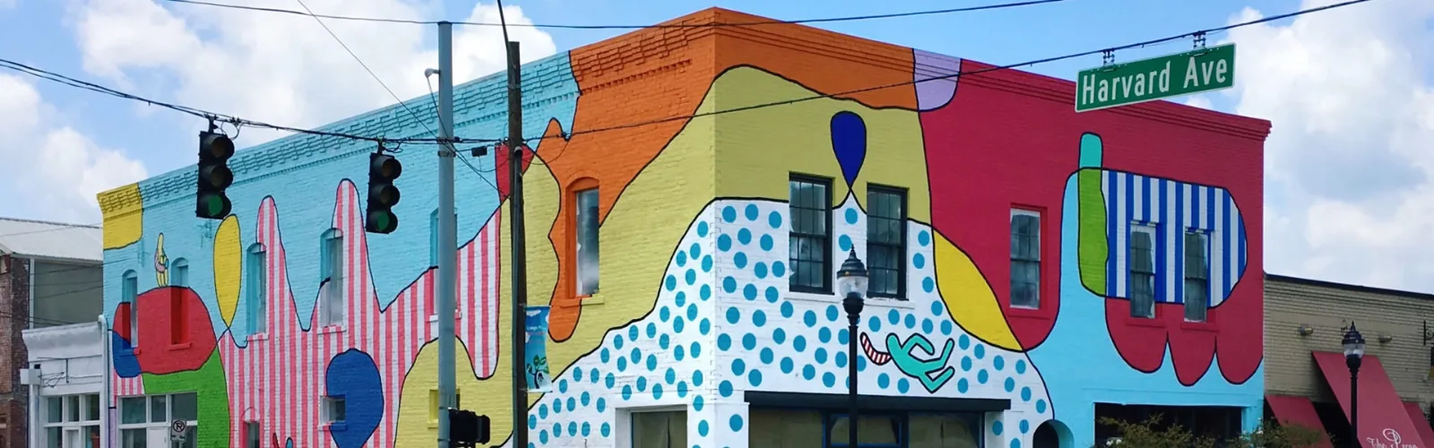 Colorful mural building on Harvard Avenue in College Park, GA