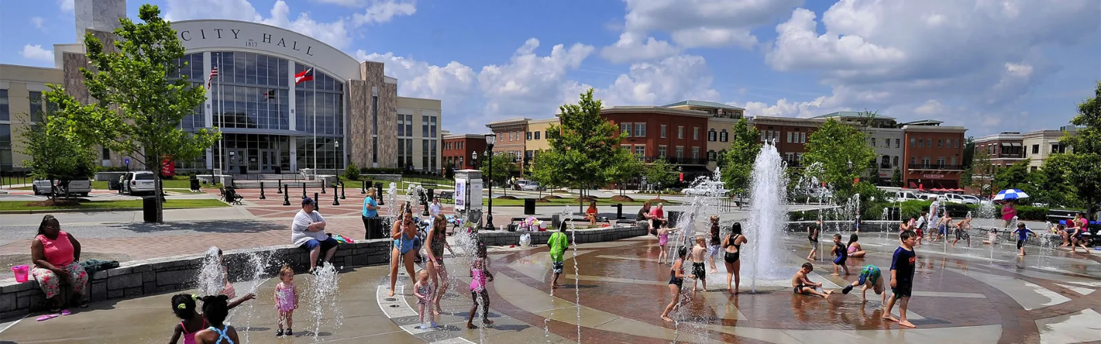 Children playing in the fountain at Suwanee Town Center, GA