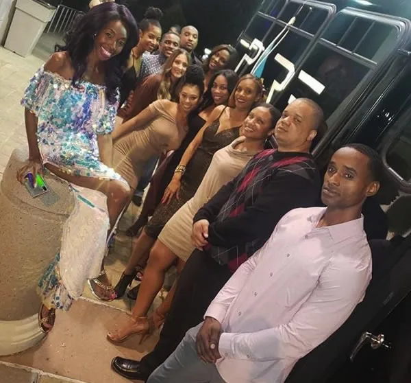 Wedding party posing inside a party bus