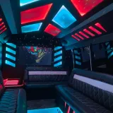 Ace of Spades party bus with red and blue LED ceiling